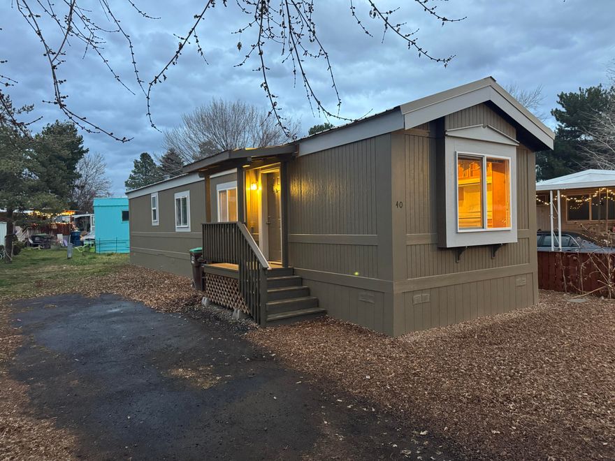 Beautifully remodeled home in an affordable park! This move-in-ready property is in excellent condition and perfectly situated near shopping, dining, schools, and all local amenities. Enjoy an open floor plan with abundant natural light, and a well-designed layout ideal for comfortable living. All appliances are included, making this home truly turnkey. Don't miss this fantastic opportunity in a great location! One pet allowed.  Water, sewer, garbage service, & snow removal included in space rent. Overflow & RV parking available for an additional fee.