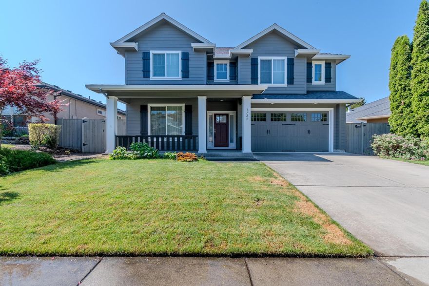 Welcome to prestigious Stonegate Estates! This stunning 4-bedroom, 2.5-bathroom home features a grand open floor plan with gorgeous Brazilian Cherry wood floors throughout. You'll enter to a large open family room with a gas fireplace, boasting a new rod item stair railing with plenty of storage. Family room leads to a wonderful kitchen offering a breakfast bar, generous pantry, and impressive elevated serving bar perfect for effortless entertaining. Upstairs you'll discover 2 exceptionally large bedrooms plus an incredibly oversized bonus room. The luxurious master suite boasts elegant, coffered ceilings, massive walk-in closets, indulgent soaking tub, and charming sit-down vanity. Efficient dual HVAC systems ensure comfort year-round. The impressive 2-car garage includes a substantial 18.5 x 9-foot workshop area. Enjoy your beautifully private .18-acre lot with lush mature landscaping and covered back patio - perfect for peaceful relaxation & delightful outdoor entertaining!