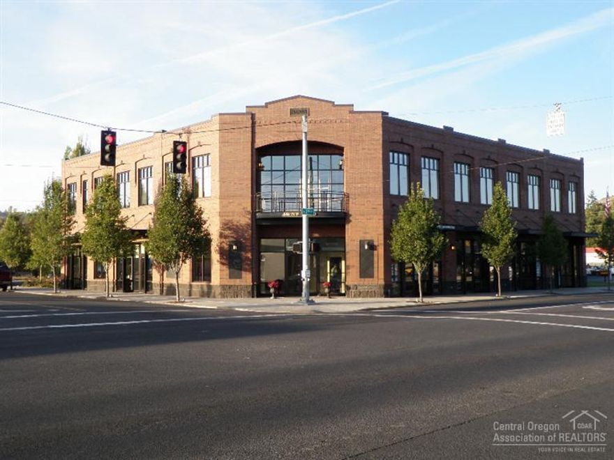 102/103 - Wonderfully built out office work space. 8 built in work stations, plus 2 private offices, break area, copy area, many built in cabinets. First class fit and finish. Frontage on 3rd Street. Beautiful office and retail building on one of Prineville's busiest corners. Classic architecture with modern facility. Off street and on street parking. High ceilings. Elevator. Spaces can be combined as they are adjacent. Good signage in Channels and blade signs.