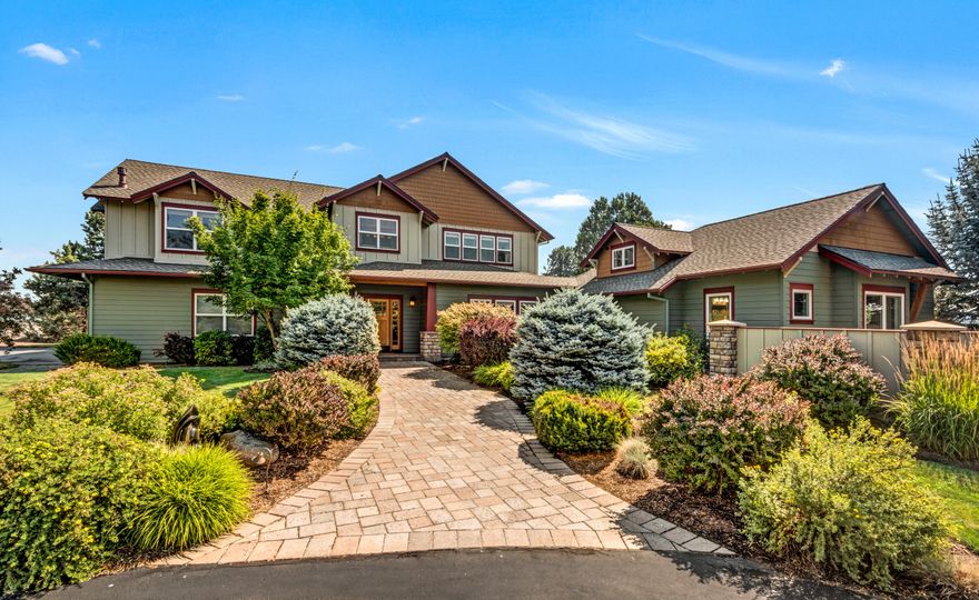 This stunning Tumalo equestrian estate, nestled within 9.49 acres of awe-inspiring landscaped grounds, beckons to be seen. The residence, boasting 4 bedrooms and 3.5 bathrooms, showcases a pair of bedroom suites. The primary of which is ideally located on the main level and includes an expansive walk-in closet, clawfoot tub, second owners laundry and a secluded courtyard with a private hot tub for relaxing. Amenities include an expansive chef's kitchen, three gas fireplaces and a bonus room with high vaulted ceilings and an adjoining office. The property encompasses an array of horse amenities including a 4 stall barn, heated tack room, kitchenette, 1/2 bath and a 150' X 230' riding arena. There are multiple large paddocks with shelters, automatic waters and 3.6 acres of irrigated, cross fenced turn out pastures. Additionally there is a three-car attached garage, a versatile shop, outdoor and indoor RV spaces and ample space for gardening and entertainment.