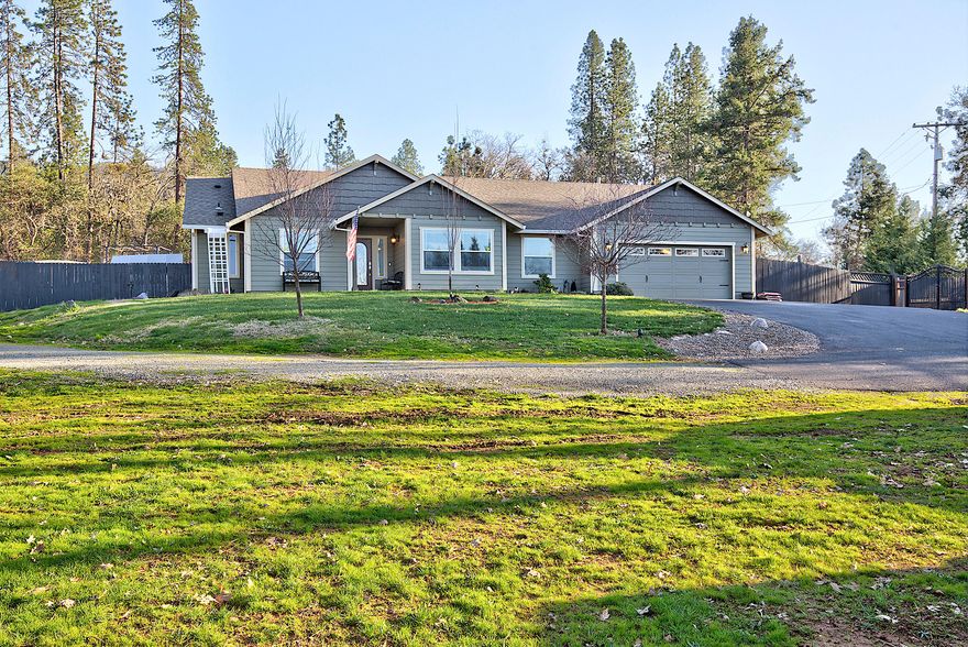 An amazing home on 1.28 acres with irrigation and everything you can imagine! A nearly 2000 sq. ft. home with a spacious and bright kitchen, cozy living room with gas fireplace, 3 bedrooms, an office and 2 lavish bathrooms. The outside boasts 2 covered patios, outdoor kitchen, hot tub, pool with outdoor shower, she-shed with bathroom (possible dwelling ~ buyer to check with county planning), 2 storage sheds, fenced garden, pond and lots of room to entertain. Great neighborhood surrounded by beautiful homes. And, did I mention the views? Come see for yourself! Schedule an appointment for a tour today!