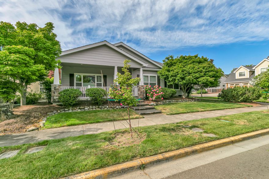 This single level 3 bedroom and 2 full bath home has an inviting open floor plan with a large great room off the spacious kitchen with granite counter tops, two-tier island/eating bar with second sink and gas cook-top. Built-in wall convection oven, microwave and refrigerator (all stainless) are included. Oak floors at entry, formal dining room, hallways and around the boarder of the great room. Gas log fireplace in the great room. Large primary bedroom with walk-in closet, double vanities, and walk-in shower in private bathroom. Both the Great Room and the Primary Bedroom have French doors that lead to a covered patio which has 2 ceiling fan/lights and
privacy shades. Additional guest bedrooms are spacious in size; One of these rooms has a double door entry and would be a great office space.