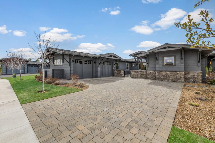 Tour of Homes Award Winning Single Level Floorplan at The Rim in the Tetherow gated golf course community. Mountain-Modern home features sunny open great room w/ cozy gas fireplace accented by granite stacked rock surround, built-in speaker/sound system, & views of the backyard of this .31-acre property.  Chef's kitchen complete w/ slab-granite prep island, quartz counters, Thermador appliances, breakfast bar & dining area w/ door leading to paver patio & outdoor firepit.  Peaceful primary suite w/ walk-in closet & spa-worthy bath w/ soaking tub, water closet, dual sinks & separate vanity. 2 Full en-suite guest rooms in separate wing of home.  Spacious office w/ built-in cabinetry & private patio access.  Gated front courtyard is the perfect setting for enjoying your morning coffee & the glowing evening sunsets. Conveniently located w/in walking distance to pool, clubhouse, restaurants, work-out facility & just a short drive to the slopes of Mt Bachelor. Landscape Maintenance provided