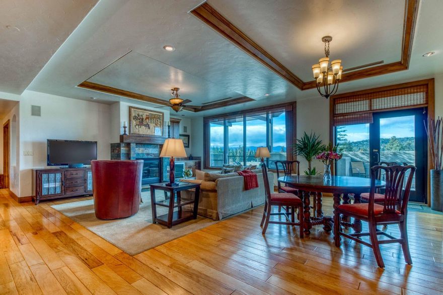 You will love luxury, urban living in beautiful downtown Bend, Oregon. This spacious, beautifully constructed 2-bedroom, 2-bathroom penthouse condominium in the Franklin Crossing building offers the urban amenities of downtown but is still a short bike ride to the trails. The large great room has expansive west facing windows providing amazing views of downtown Bend, Mt. Bachelor, Broken Top and the 3 Sisters. Huge, west-facing 5th floor outdoor balcony for barbecuing and gazing at the urban and natural splendor. Amazing wood work and detail throughout the penthouse. Includes two parking spaces in the underground parking garage, use of a ski locker, and a personal storage room on the 5th floor of the building. This is a plug and play opportunity to enjoy all that Bend has to offer.