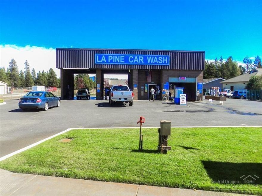 LaPine Car Wash - Owner Financed Business Opportunity! Own the half+ acre commercial property, own the fully operational income generating Car Wash building and all the equipment! Equipment is in great condition and located on a busy street downtown! 2 bays manual and one auto bay that the owner does customer service and pre-rinse the car first,2 vacuum island and the city will allow for a coffee stand in island of lot with CUP!