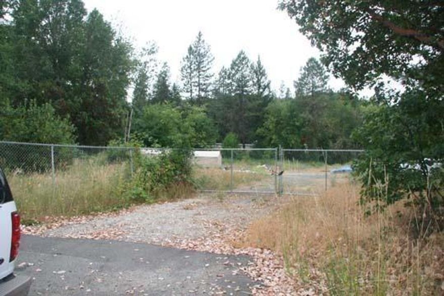 Property has great location, with I-5 access nearby. Zoning is rural commercial which allows commercial / industrial / manufacturing applications. Possible storage yard for I-5 shipping. Mini-storage possibility also. Well is in and septic approved for standard system. Ready to fully develop. Unlimited potential and owner motivated.