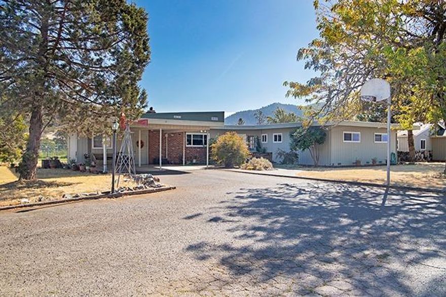 Convenient Location and on a Quaint Quiet Country Cul-de-sac w/ just a few neighbors. It's a Mid Century Modern one level rambler w/fantastic upgrades, 180 degree views, useable 1/2 acre, Shop/Studio, Garage, parking for 4, RV too. All Inspections! New Real Hardwood Floors. Slate Stone entry. Granite counter in Kitchen. New Range/Oven, D/W, interior & exterior paint, dbl pane vinyl windows, new septic, gas forced heating, heat pump air plus beautiful centerpiece fireplace & open beam ceilings, refurbished true to period tile and brick accents. Large Utility room/Canning room & Great Screened in porch. Fully fenced back yard & garden area. Studio/Shop is finished w/ heat, air, a walk-in closet & 1 car garage. 2 car carport and plenty of additional parking. New septic drainfield. Well Water. County low taxes. Inspections. Warranty. INCLUSIONS Cont. Riding lawn mower, sump pump.