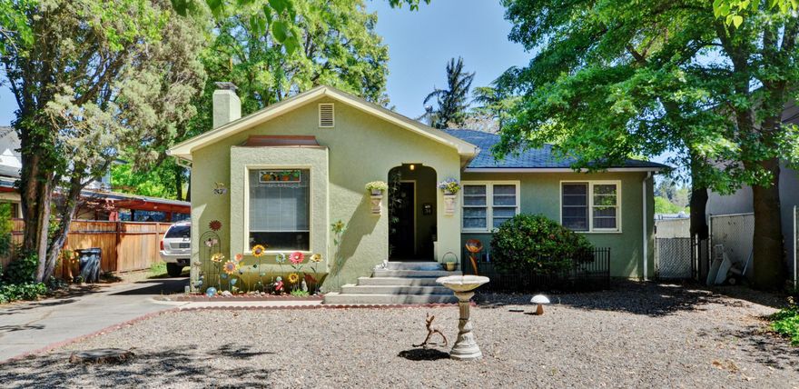 Opportunities Opportunities Opportunities!! This home sits on a large lot in East Medford that can be used as residential or commercial (per seller).  On .20 Acres you have RV parking behind the fence as well as in front of it- a detached 2 car garage, porch and a covered patio.  This well maintained home offers 3 good size bedrooms, separate dining room and laundry area. Hardwood flooring throughout the house, a beautiful fireplace, and a remodeled bathroom. Newer vanity, sink, flooring, tile work, toilet and paint in the bathroom.  Easy maintenance front yard and close to many amenities in town.  Buyer to do due diligence on Commercial use- could be used for professional use- Dr. Office, Accounting office etc per the seller.