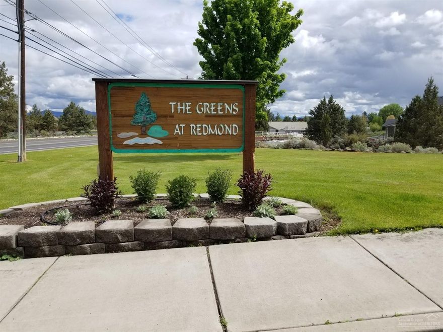 Wow you are going to love this new home in the Greens. SW Redmond with easy access to Bend. Single level 1896 sq ft of living area plus a attached Triple car garage. Super large Great room adjoins the kitchen with abundance of custom cabinets and eating bar. Large master with boxed ceilings , master bath with double sinks oversized walk in shower. 2 more nice sized bedrooms, separate utility, 2.5 baths, guest closet and large covered entry porch. All this on a large .17 acre lot with sprinklers and landscaping & fencing.