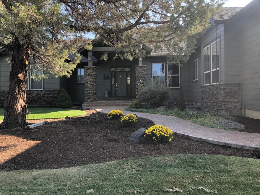 Beautiful custom home on acreage with end of the road privacy,  access to public lands & the Deschutes river. Open floor plan with 10 ft ceilings, numerous large windows & skylights. Architectural features including vaults, coffered ceiling, archways, and built-ins. Peaceful outdoor patio to enjoy with family & friends. Cook's kitchen with a large island, lots of cabinetry & pantry. Large open great room with access to patio area. The primary suite has a sitting area, walk-in closet, and exterior door to the patio for easy access to a hot tub area.. Primary bath has separate vanities & a large soaking tub. Three large bedrooms & hall bathroom. Oversized laundry/mud room with additional bathroom, lots of cabinets, built-in for refrigerator, and access to abundant hall storage cabinets with pullouts. A 300 sq ft. bonus room above the garage has a wet bar and refrigerator.  Makes a private guest area or possibly separate living space. Bonus room not included in listing square footage.