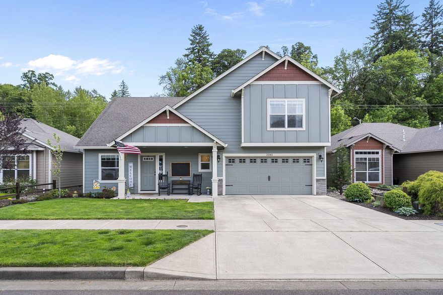 This Craftsman, 3-bedroom plus an office AND a bonus room, 2.5-bath gem boasts an open-concept design with soaring vaulted ceilings, timeless finishes, a cozy fireplace, and a gourmet kitchen featuring a gas range, granite countertops, a full tile backsplash, and a spacious walk-in pantry. The main level includes a spacious primary suite and a dedicated office, while upstairs offers two additional bedrooms and a large bonus room. The backyard has a fire pit, covered patio, and expansive lawn for endless outdoor enjoyment. This home is in the highly sought-after Cottonwood Lakes neighborhood of Southwest Salem, backing directly to the scenic 1,200-acre Minto-Brown Island Park! Just minutes from Downtown Salem, Gerry Frank Amphitheater, Salem Golf Club, dog park, and endless walking trails, this location offers the perfect blend of tranquility and convenience.