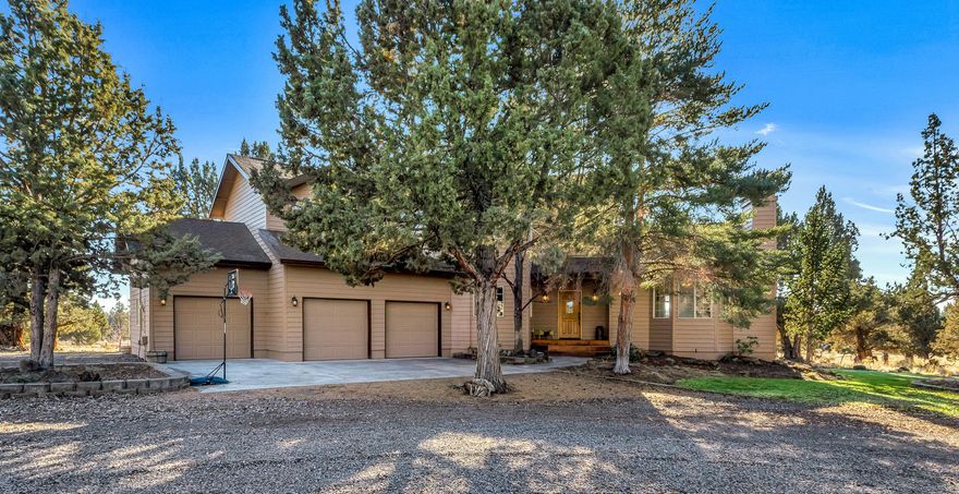 Custom built home on a very private setting lives like a peaceful retreat just minutes from town.  14.7 acres of fenced and cross fenced land with 8 acres of irrigation.  Light and bright home with large windows, Cascade Mountain views, vaulted ceilings, exposed beams, hardwood floors and granite counters.  Terrific outdoor living includes pastures, large pond, expansive decking, fire pit, arena, 2 stalls and tack room, dog run/kennel, almost new hot tub, 10,000sf of newly installed lawn and new underground sprinklers front and back.  Plenty of room for equipment, toys and storage with attached 3 car garage, detached 32 x 30 insulated shop with 220v power and garage doors and new 44 x 56 pole barn.  This property is truly a must see.