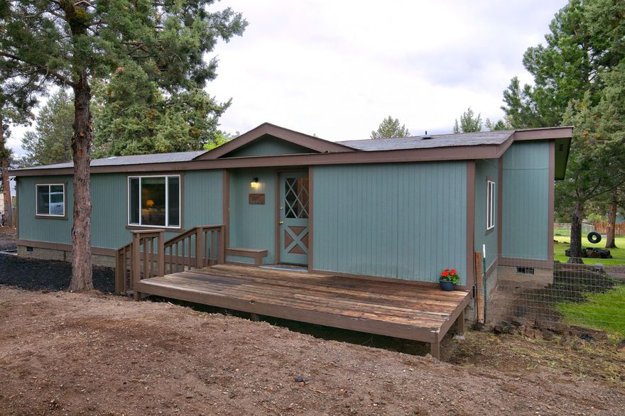 Enjoy peaceful, private Tumalo living on this fully irrigated 1.01 acre oasis with mature trees, large pond, detached two car garage/shop, shed with power and lots of storage. Many recent improvements to this charming single-level, three bedroom, two bathroom home including A/C, new wood stove, upgraded Brazilian cherry kitchen cabinets, upgraded appliances, new carpet and laminate flooring. You will not find a more perfect backyard for family adventures: swing from the tire swing, climb and explore around the tree house and play area, enjoy endless evenings together by the fire pit making s'mores and watching the sunset together. Room for RV parking. Easy access to Hwy 20 and Hwy 97, 2 minutes to Target, Trader Joe's, Starbucks, restaurants and shopping. Don't miss out on this opportunity to own a little piece of paradise in Bend.