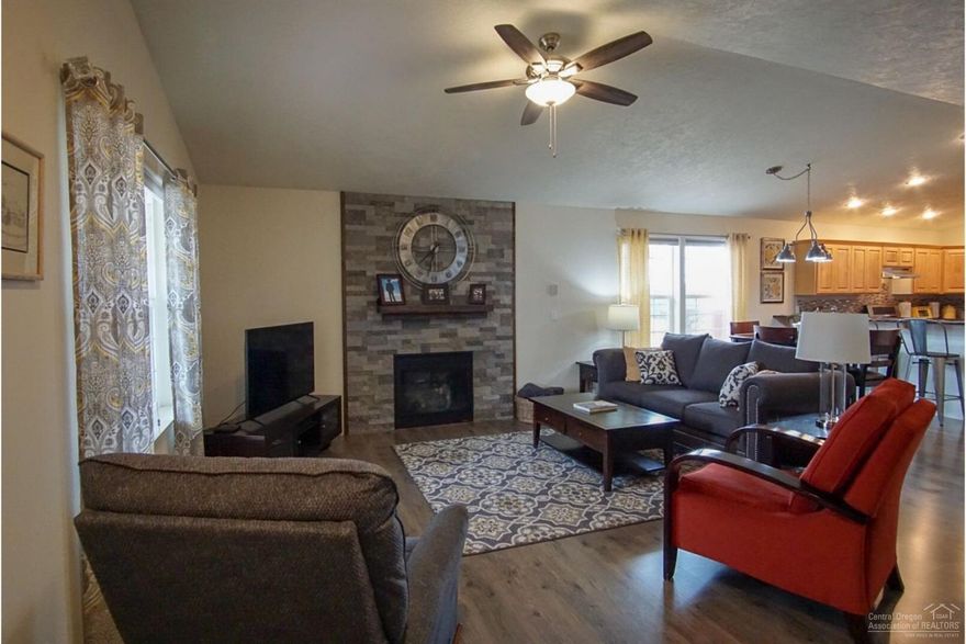 Beautifully updated home with an open floor plan and vaulted ceiling and stacked rock gas fireplace. Large kitchen with granite counters and tile backsplash and stainless steel appliance and lots of counter space including a raised breakfast bar, bathrooms have been updated with granite and tile work as well and updated flooring throughout. Home has a gas furnace and A/C for efficient heating and cooling on a large lot with plenty of room for your RV. This home is move in ready!