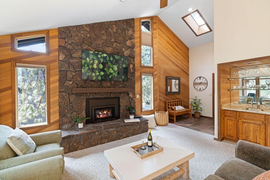 TURNKEY property! Perfect second home or investment opportunity. Don't miss this rare opportunity to own this beautifully appointed upstairs condo at The Ridge. Open floor plan with gas fireplace framed by a stunning basalt hearth. Enjoy the natural beauty of Sunriver. The Ridge offers fantastic amenities, including seasonal swimming pool, year-round hot tub, clubhouse and sports court. Nestled near the breathtaking Cascade Mountains, Deschutes River and pristine lakes. Purchase the SROA membership card ($85 for 2025) gives you access to the SHARC pool and members only lounge & gym; the marina, north pool and discounts throughout the Sunriver. This condo is an ideal retreat for outdoor enthusiast. Rentable short-term or long-term; service-dogs only. Lock & Leave convenience. Smoke-free property. Make this Sunriver escape yours too!