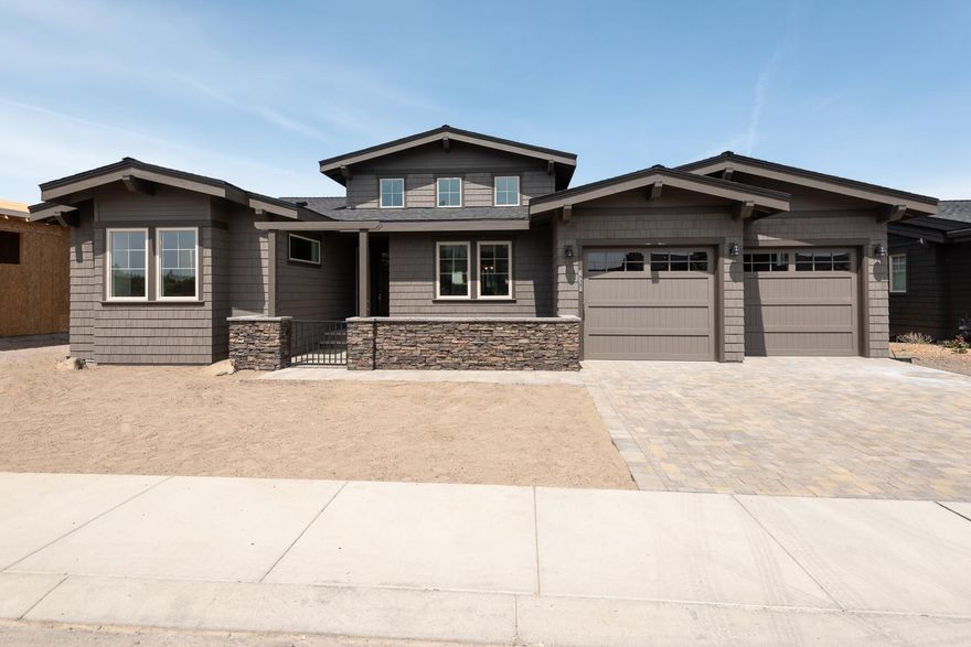 New home ready mid April! This stunning premium view lot with Cascade Mountain and golf course views is conveniently located on The Rim near the Tetherow clubhouse, fitness center, pool and 3 restaurants. Main floor master suite with fabulous bath & private covered balcony; gourmet kitchen opens to impressive great room with large covered balcony. 2 en suite bedrooms & office on main level; 2 addl. en suites & bonus room on lower level. Beautiful finishes throughout. Low maintenance as HOA maintains all outdoor landscaping. Outdoor fireplace, triple tandem garage.<br>