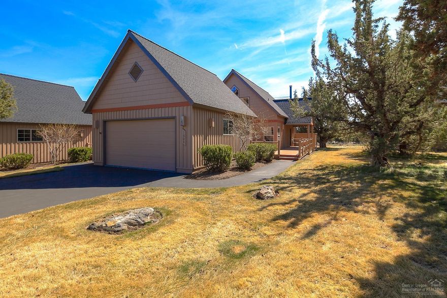 Fabulous furnished chalet loaded with upgrades! Knotty pine paneling, hardwood floors and quartz counter tops. Great room plan with 3 bedrooms, loft and 2 car garage. Expansive deck with hot tub and awning overlooking the fairway. Brand new HVAC. Eagle Crest is home to three 18 hole golf courses, 3 sports centers, a day spa, and miles of trails.