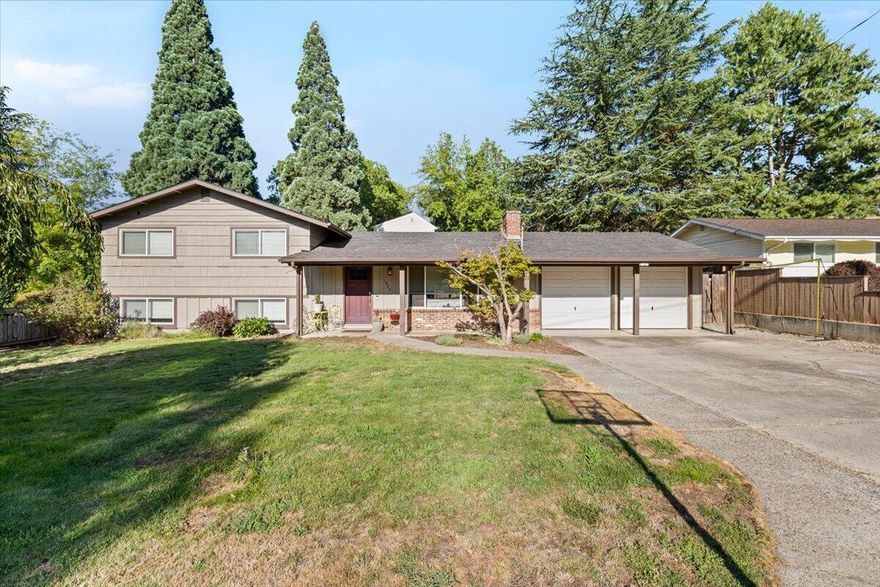 Multi/split level home in a quiet and private neighborhood! This clean and move-in ready 4 bed, 2 bath split-level home offers 1,656 sq ft of comfortable living space and a large backyard! The vaulted ceiling creates an open feel in the updated kitchen and family room. The kitchen features stainless steel appliances, beautiful countertops, and modern finishes. BRAND NEW HVAC system! Fresh paint and updated touches throughout. Enjoy the large, fenced backyard with a chicken coop, and room for pets and entertaining friends and family. The attached two-car garage includes a rear drive thru garage door for easy backyard access. Downstairs there is a daylight basement for extra living space, workspace, playroom, etc. Located within walking distance to Bear Creek Park, Medford BMX, Medford Skate Park, and just minutes from restaurants, shopping, Hoover Elementary, hospital, and freeway access. Don't wait to tour this home - it won't last!