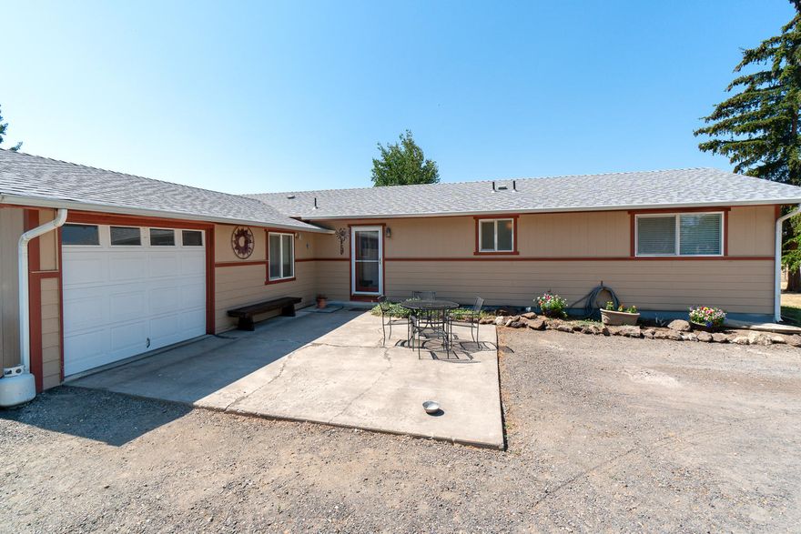 Enjoy sunsets over the Cascades from your own back deck! Situated on the edge of Redmond in a quiet area of small hobby farms & horse havens. Classic ranch style home has been updated inside & out & is the perfect spot to call home. 3 bedrooms, 2 baths, mud room entry. Open kitchen w/island, granite countertops, glass top range, plenty of space & storage. Mtn views from the living room & room for lg family gatherings. Corner wood burning fireplace will keep the entire house cozy all winter, forced air heat & AC too! Outside you'll enjoy views of Smith Rock & Grizzly, irrigated pasture & pond. 1728 sf barn with stalls, turnouts, tack area & storage loft. Great setup for animals w/covered RV area in the center. Riding arena on east side of barn was once a beauty, could be tilled under to restore it! Home has new roof, siding & paint, all the hard work is done - come make it yours! (Bonus room not included in sf)