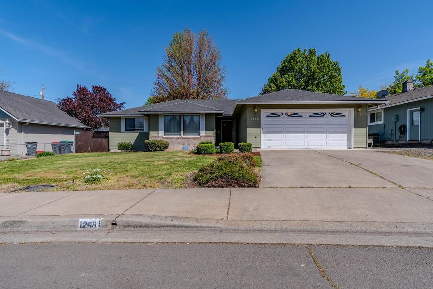 Welcome to 1258 Paulita Dr. This 3 bed 2 ba home is nestled in the heart of East Medford on a great street. The home's prime location offers easy access to local business, schools, and parks, making it an ideal choice for families and professionals alike. User friendly floorplan opens up to the generous fenced back yard complete with newer sparkling swim pool/ spa perfect for family fun or just relaxing. Open kitchen with upgraded appliances plus breakfast bar and comfortable living spaces and ample natural light throughout. Natural gas fireplace to create ambiance in dining area plus ample sized living room for that large flatscreen. Move in ready or make it custom for you.
