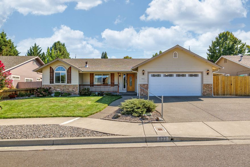 Welcome Home. This 1504 sq ft. 3-bedroom, 2- bath home radiates warmth and charm in a modern open floor plan. Spacious kitchen with backyard views and pantry. Lovely wood & tile floors in main areas with carpet in the bedrooms. Gas fireplace in the living room area for cozy winter nights. Split bedroom floorplan, primary bedroom has a large walk-in shower. The backyard is delightful with lovely landscaping and a nice feeling of privacy, great for entertainment. Pathways to a gardener's storage shed, sprinklers in both the front and back yards. Covered carport area for boat or car with gated access. New roof a couple years ago. Great starter or a downsizing retirement home.