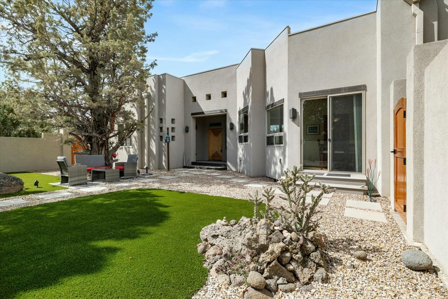 Welcome to your private riverfront sanctuary in the sought-after community of Odin Falls Ranch. Set on 2.25 acres, this gently lived-in, custom single-level home offers modern Southwest charm to enjoy the sights and sound of the river. The open floor plan is filled with natural light from expansive windows, creating a warm & inviting atmosphere. Enjoy cooking in the well-appointed kitchen with six burner cooktop, and granite tile counters. Custom lighting perfect for displaying your artwork, a cozy breakfast nook, and a spacious dining area perfect for gatherings. The primary suite is thoughtfully positioned apart from the guest wing, providing privacy and comfort. Custom cabinetry, dual sinks, tile walk-in shower and Japanese soaking tub with air jets. Step outside to the expansive deck and take in the peaceful setting, abundant wildlife, and the quiet beauty of nature. Complete with an attached RV garage for all your adventure gear. Odin Falls Ranch  is a Firewise Community.