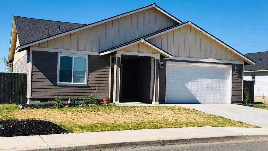 UPDATE... Beautiful home, located in Roy Heart Estates. 3 BD, 2 BA, 1,873 sqft, Oversized 2 car garage, equipped with upgrades throughout. This home is designed with 9 foot ceilings, granite countertops in both kitchen and bathrooms, upgraded hardwood floors, upgraded carpet. Custom cabinets, large kitchen with an exceptional open room concept. Oversized bedrooms, along with gas fireplace in living room. Landscaped front & rear yard, in-ground sprinkler system, and a deck/patio as well. COVID-19 Precautions Taken; see attached document. This wonderful home is vacant, turn-key, move in ready!