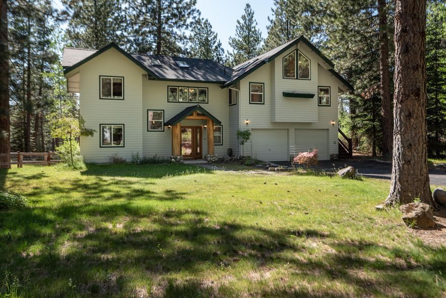 Nestled in the pines on the Deschutes River in SW Bend, this is a quiet retreat w/private river access. The reverse living home offers 2,228 sf w/2 bedrooms on the ground level and up-stairs a vaulted great room, kitchen, office, primary bedroom, family room with fireplace, and large back deck to take in the views and sounds of nature. The kitchen is finished w/granite counters, stainless appliances, & rich wood cabinetry. Updates include a freshly painted interior, new carpet, roof, recently painted exterior & remodeled primary bath. Outside features include a paved driveway, 1,140 sf shop, and plenty of additional parking for an RV & toys. This would make an incredible primary home, vacation home or short-term rental. With the ability to fly fish just a stone's throw away and enjoy the Lava Island Falls and National Forest views, all while being just minutes to Bend's Old Mill District, shopping, dining & more, this is an incredible and unique opportunity!