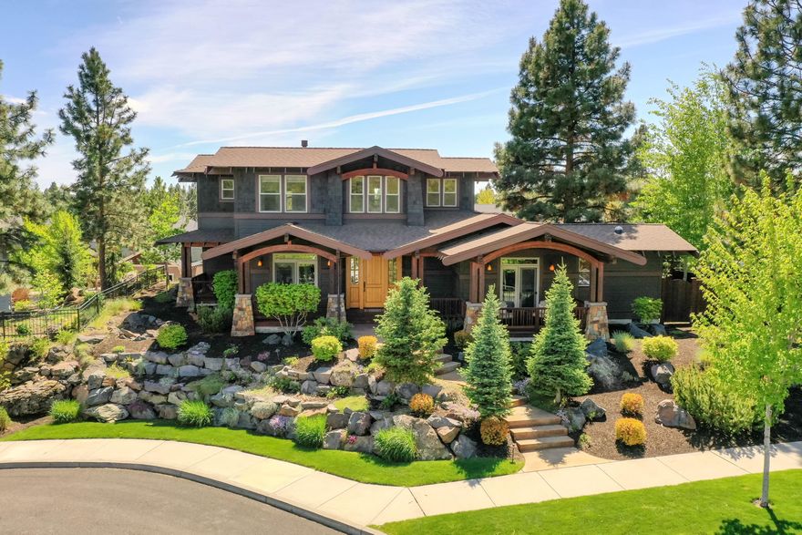 This custom craftsman style home situated on a quiet cul-de-sac in desirable Northwest Crossing is truly one of a kind. The list of features is seemingly endless, featuring solid hickory hardwood floors; two gas fireplaces, one of which looks through between office and sitting room; three car garage with built-in workbench and temperature controlled hose bib; wine closet with cork flooring; concrete counter tops in kitchen and wet bar, plus antique finish on chocolate colored granite atop kitchen island; and much more. Main level includes master suite, den, a sitting room and family room, kitchen, dining room, and breakfast nook. A second master suite upstairs boasts mountain views. Enjoy a sense of ease and comfort with the home's central vac, hot water recirculation pump, smart home lighting, as well as abundant lighting from skylights and solar tubes. Experience all Bend has to offer from this quarter acre lot situated near retail, restaurants, and recreation.