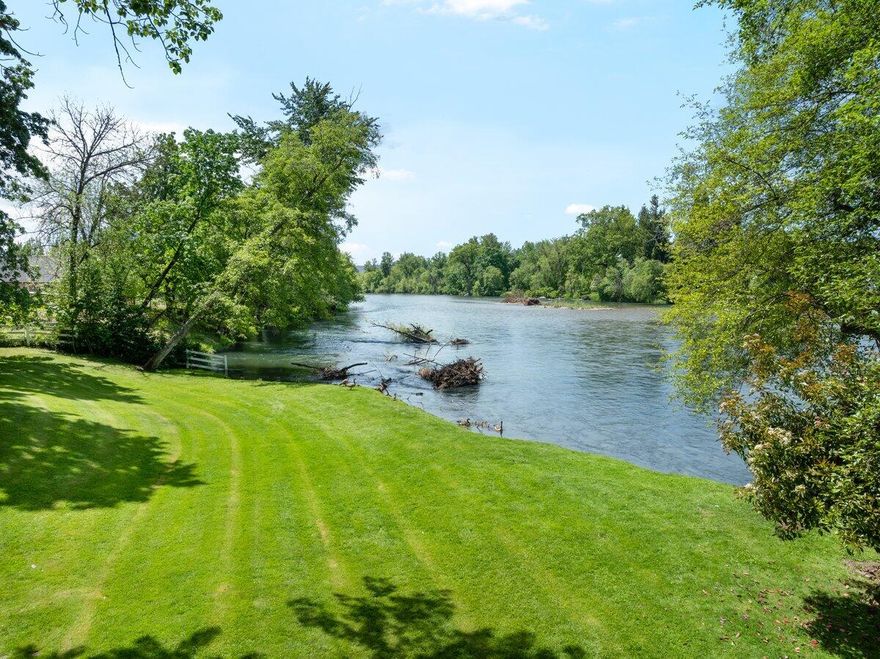 Discover the unmatched beauty and privacy of this 2.09-acre EFU-zoned riverfront parcel, nestled along the scenic Rogue River. With its own well, septic system, homesite approval, and irrigation rights, this property is ready for your vision—whether that's a dream home, private retreat, or long-term investment. Currently serving as green space for the adjacent estate (listed separately under MLS# 220204996), the grounds are professionally landscaped and offer a rare blend of open space and natural seclusion. Cast your line for salmon and steelhead right from your backyard, stroll your own riverfront sanctuary, and enjoy peaceful mornings surrounded by the sounds of nature. This is more than just land—it's a lifestyle. Don't miss your chance to own a piece of riverfront paradise.