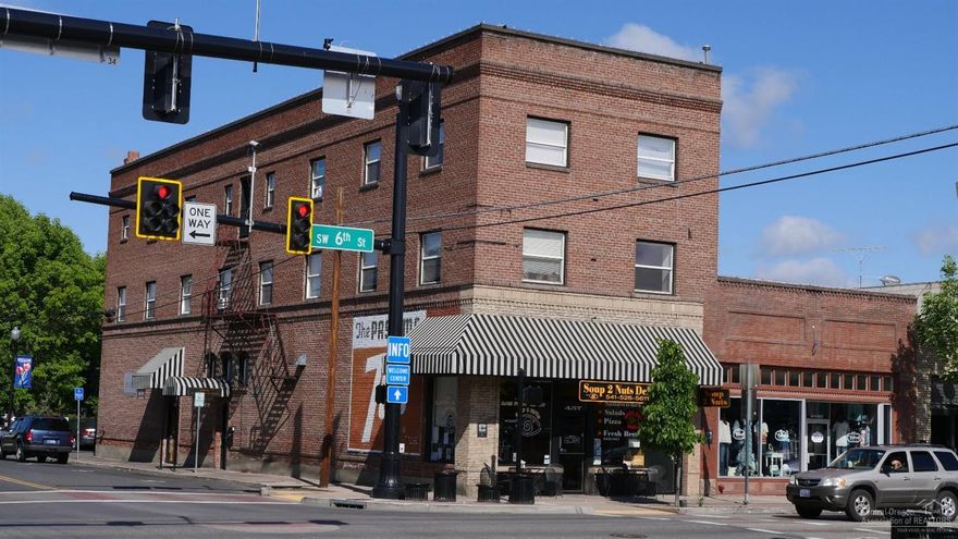 This iconic downtown mixed-use building is a perfect investment property. It features a three story building with two retail tenant on the ground floor and 12 apartment units on the second and third floor. The majority of the apartments are studio apartments and all of the tenants are on month to month leases. The two anchor retail tenants include Soup 2 Nuts and Salon Bliss.