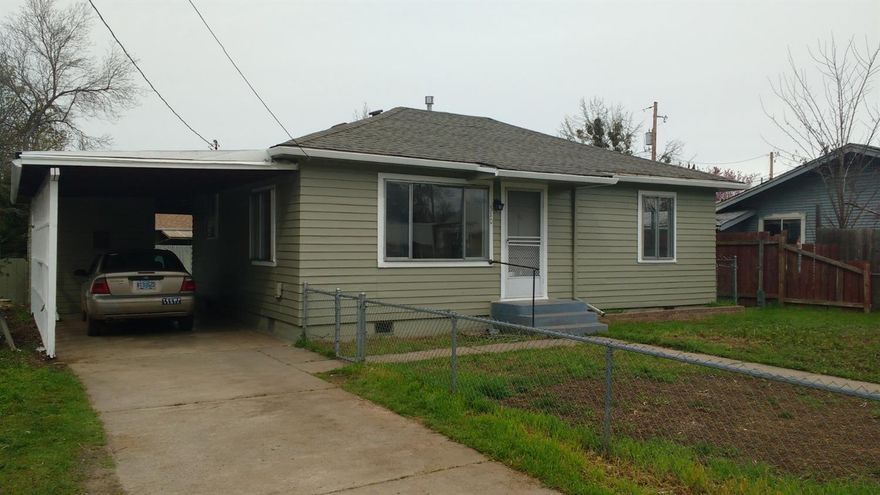 Bring all investors. 2 bdrm/1 bath on .12 of an acre. Minutes from elementary and middle schools. Private backyard and nice open kitchen. Fresh paint inside and outside. Refurbished wood floors.