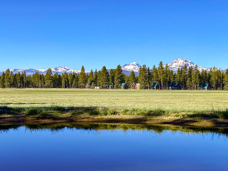 A breathtaking property set against the National Forest for incredible privacy. This
secluded paradise offers 147.02
acres of meadows, ponds and timber with 46.5 acres of water rights plus an additional 10 acres of water rights for the two ponds
and pastures all fenced. Amazing wildlife sanctuary with viewing opportunities of elk, deer and much more. This great location is set near the charming towns of Sisters and Bend and all the amenities and events they offer. Don't miss this opportunity! This is a dream location for all your recreational opportunities! Come live your best life on
Indian Ford Road in beautiful Central Oregon.