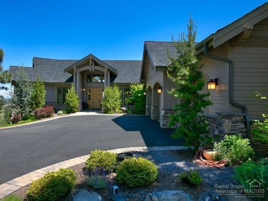 One of a kind river, Cascade Mtn, & city views from this stunning NW style home. Great room plan w/marble floor entry, stacked stone FP, hickory hardwood floor, & beautiful wood beams. Kitchen features solid slab granite counters, knotty alder cabinetry, walk-in pantry, SS appliances & breakfast nook. Spacious master boast a gas FP hearth, blt-ins, his & her closets, tiled shower, dual vanities w/marble counter tops & radiant floor heating. FR, media room & game room. Gorgeous landscaping w/water feature!