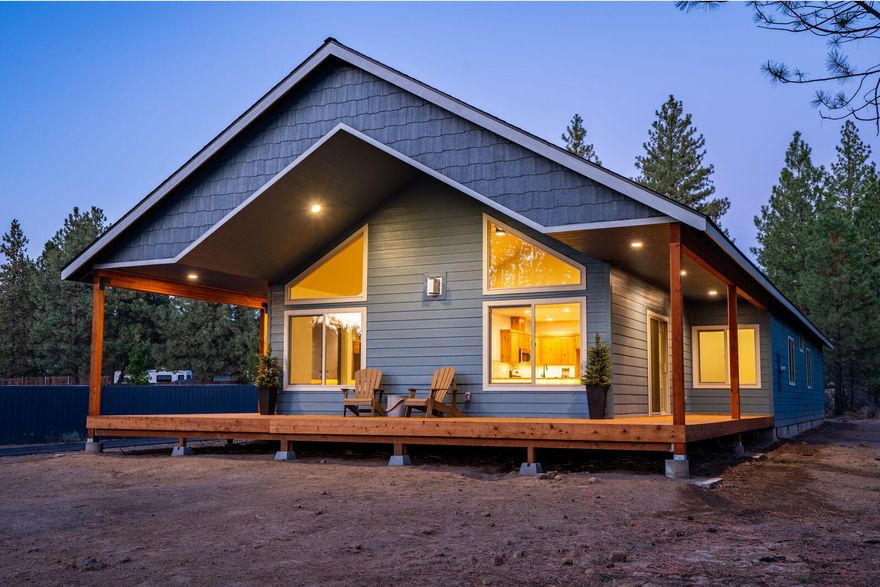 Newly constructed single-level on nearly 1 acre blends modern comfort with rural charm, just minutes from town and SW Bend's Brookswood Meadow Plaza. This 3-bedroom + office, 2-bath home features vaulted ceilings, expansive windows, and an open-concept great room filled with light. The kitchen offers solid quartz counters, breakfast bar, knotty Alder cabinets, and double door pantry. A huge laundry room with matching quartz counters provides generous storage. The primary suite includes a custom double-headed tile shower and peaceful retreat. Enjoy outdoor living on the wrap-around deck. A paved driveway offers easy access with room for landscaping, garden, or shop. Private setting near trails, shops, and dining. Adjacent .86-acre parcel at 60332 Hiawatha also available for $325,000 when purchased with this property, with water, power, and septic approval in place—build another home, add a shop, or enjoy the extra space.