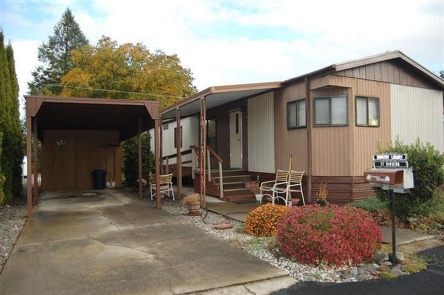 Riviera Mobile Home Park (55+ community) with access to the Rogue River. Enjoy fishing & relaxing along the river's edge in a beautiful park like environment. There's a clubhouse for all to enjoy. This is an ESTATE SALE...HOME IS BEING SOLD AS IS... really! Estate will not do any repairs if required. All personal items in the pictures will be removed soon. (Buyer to verify heating/air type)