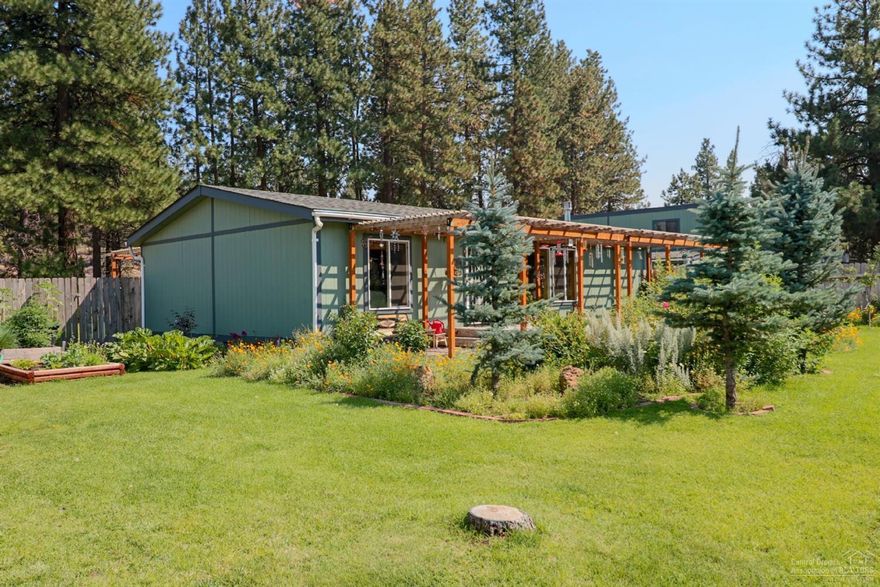 450 sq.ft. shop w/ 11' auto. door 2nd garage w/ auto, insulated door New 30 yr roofs New vinyl, dbl.pane windows New heat pump New granite, flooring Remodeled bathrooms including 4'x 5' shower in mstr bath All buildings recently painted All windows, doors cased in wood-all wood blinds Pergolas and decks front + back Hot tub Garden shed Completely fenced + cross-fenced with 6' cedar Raised gdn beds, gorgeous landscaping+pond Auto irrigation on entire acre 2 RV sps with power, water--one with sewer plumbed in