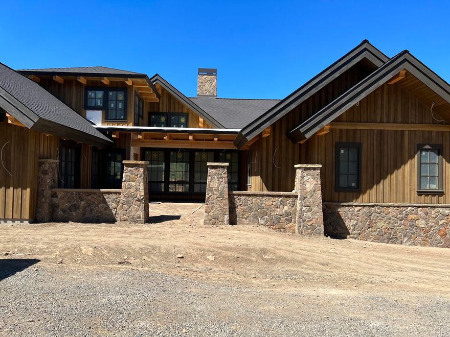 Completing construction of this 4,120 s/f custom home on 2.5 acres in Bend's  Westgate neighborhood adjoining Shevlin Park. Patios and decks abound with amazing use of natural light and beautiful finishes planned for every inch of this single story great room plan! Rooms include 2 Primary bedrooms, 2 additional bedrooms of which 1 may make an excellent den/office, Media room and a spacious Kitchen with a large walk-in pantry, separate mud/gear room and storage galore  in a very large 1,791 s/f extra deep triple garage and an additional room in the rear. A complete list of amenities and materials is included in this listing documents. This price includes a custom pool and patio surrounds. Taxes reflect land only. Permitted plans available for an additional 480 s/f Guest-5th bedroom at an additional cost!