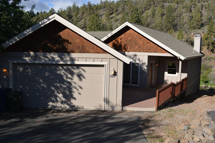 Deschutes River Frontage, small neighborhood adjoining Sawyer Park and river trails, perfect central location. Quiet cul-de-sac and easy single level living. Great room concept, vaulted ceiling, updated kitchen, slab granite, huge island, Viking stove, wine cooler, floor to ceiling fireplace and everything overlooks the river. Additional living area downstairs with 3 bedrooms all opening to the outside deck. MUST SEE, best value on the river in BEND!!