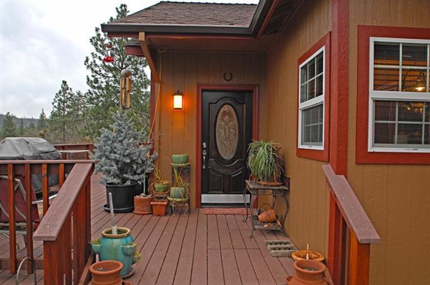 Million Dollar Views!!! Don't let this one slip by! Gorgeous 1737 sq ft home situated on over 4 acres of pristine beauty. Private road dead ends at BLM land and the property line backs up to 200 acres of BLM land. This is the perfect place to call home. New paint inside and out in 2014, solar panels installed and online with Pacific Power, new Trex deck, new heat pump, trendy bamboo flooring throughout the house. Fully insulated garage. Soak in the amazing views while taking a dip in the luxurious gunite in-ground pool!. Lots of wildlife will keep you company in this very comfortable home!