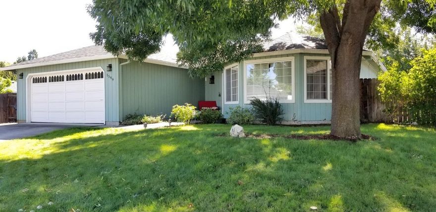 SW Medford home with RV Parking! Here is the perfect SW Medford home you have been looking for. Spacious floor plan with over sized living room with huge windows for tons of natural light.Enjoy cooking in the newly updated kitchen with gorgeous granite counter tops and new sink. From the dining room enjoy easy access to the patio and enjoy the large backyard with plenty of room for pets or a pool.This home is 3 bedroom, 2 bath with 1424 sq feet on a large .18 lot. Home has gorgeous brand new laminate flooring throughout and new flooring in both bathrooms.The indoor laundry room leads to the double car garage and access to ample RV parking behind the double gate. Apx 14x70 feet of RV parking behind the gate for all of your toys and new roof in 2015! Located close to South Medford High and located in the Griffin creek Elementary district, this home is truly a perfect package