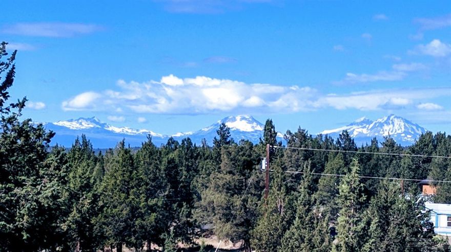 This lot is ready for your new home. Quiet location with an elevated building sight at the rear of the lot providing views of the Cascade Mountains. The driveway is installed and two building pads have been prepped for a home and separate shop. The water meter is set and water has been installed in locations on the lot. There is a 1500 gal. septic tank and standard drain field installed. Power is located at the street.