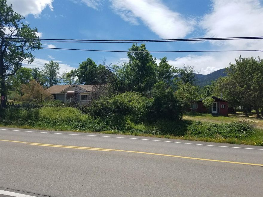 Amazing Views! Close to Emigrant Lake and only 2.5 miles to I-5! The main home could use some updating. This home is ready for your vision. Only 10 minutes to downtown Ashland. If you want to own rural property in Ashland,this is the place! EFU Zoning, gardening, livestock, etc. There are also a couple of storage sheds.