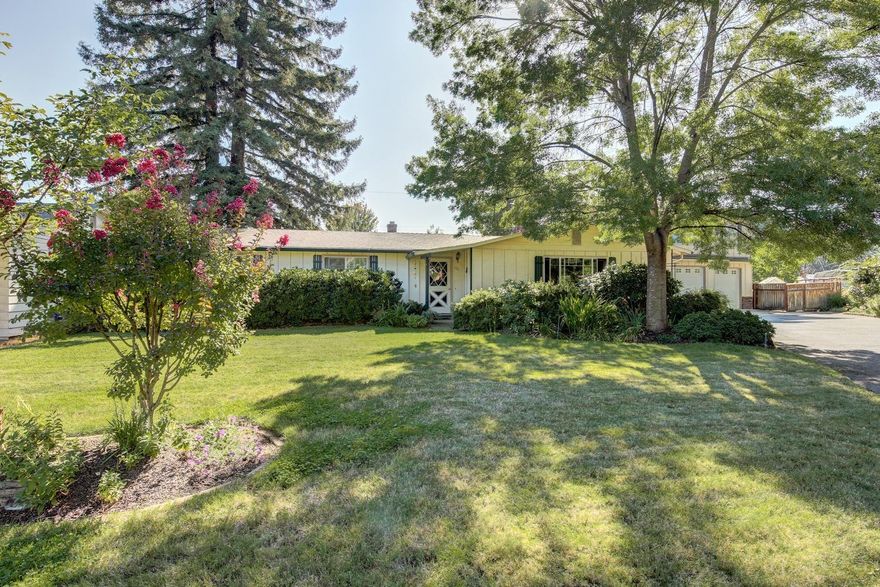 Pride of ownership shows, immaculately maintained home features large living room, brick fireplace with gas insert. Open kitchen, lots of natural light, french doors leading to covered patio. Oversized family/game or hobby room above 3 car attached garage. Large laundry room off kitchen with door to backyard. Well manicured front and rear yards with vegetable garden , completely fenced backyard.