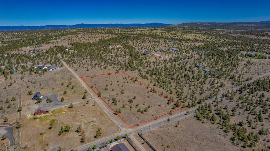Beautiful 5-acre parcel located just outside Prineville, offering expansive views of the Cascade Mountains. This flat and fully usable acreage provides an ideal canvas for your dream home, hobby farm, or weekend getaway. Enjoy the tranquility of Easter Oregon with room to roam, yet remain conveniently close to town amenities. Power is available at the street, simplifying your future build plans. Whether you're seeking space, scenery, or a smart investment, this property checks all the boxes.