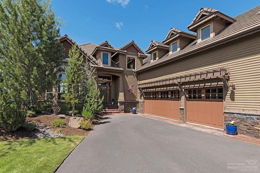 Timeless craftsmanship abounds in this spacious Broken Top estate sitting on a private .43 acre lot! Enjoy sunset views overlooking the 14th fairway, entertain guests in the vaulted great room or formal dining, or just relax on the beautiful stone fireplace hearth. In addition to the 4 bedrooms, this home features a den/office with glass french doors, a large bonus room over the 3-car garage, a main-level master suite, A/C, granite countertops & beautiful custom finishes throughout!