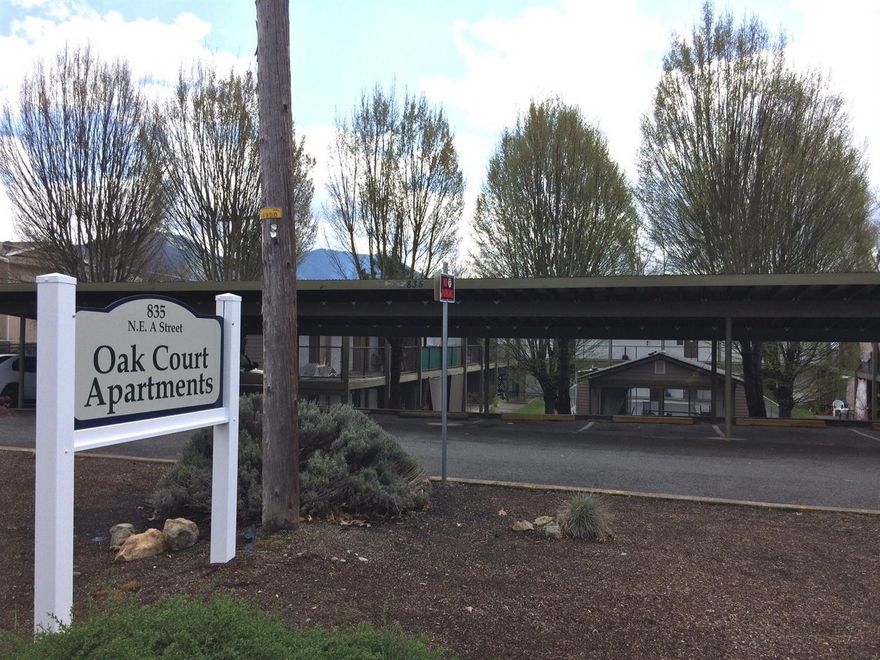 Oak Court Apartments provide a solid multi-family real estate investment. 24 rental complex consists of 4 one-bedroom, 16 two-bedroom and 4 three-bedroom/one bath units. Many units were upgraded with fresh paint and new carpet in 2016. Fully rented project produces $13,205 monthly plus a percentage of revenue from laundry facility. In-ground pool with a clubhouse is the central focus of the large courtyard. Includes large parking lot behind complex, off of NE Victoria. Conveniently located in NE Grants Pass; close to schools, shopping and restaurants.