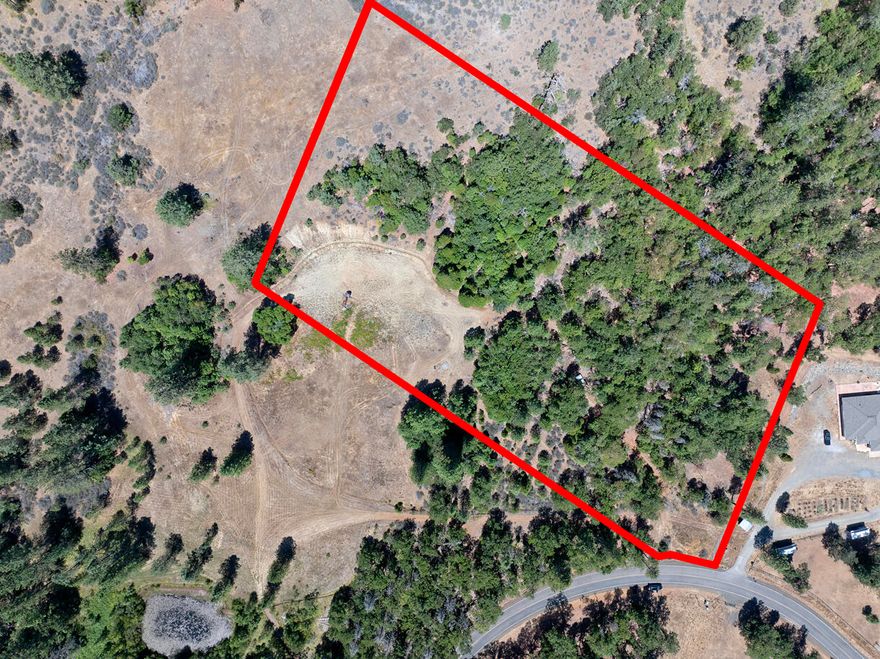 Acreage with a view!  5.01 acres with awesome views in a quiet, secluded area of the beautiful Illinois Valley.  Backed by BLM. Power is close by.  Septic is installed.  The properties near this land have good producing wells.  Buyer to do due diligence regarding potential intended usage.