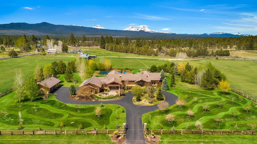 Absolutely stunning West Tumalo gated estate encompasses 11+ acres of majestic Cascade Mtn views located steps away from the Deschutes Nat. Forest & Tumalo Reservoir trail system w/ miles of running, bike & horse trails. Minutes to Bend, this is truly a spectacular property with every upgrade imaginable in this 5614 sf single-level high efficiency passive solar designed home. Enter to framed mountain views through immense glass door. Gourmet kitchen doesn't begin to describe it; the love of entertaining is a requirement. Memories will be made & shared by wood burning fire. North & south bedroom wings flank courtyard. Stroll the grounds complete with pasture, orchard, trees for privacy, pond w/ bridge & waterfall. Fully fenced & cross-fenced 10.19 acres of auto WIFI irrigation plus barn. Attached 3-car and detached 2-car heated garages, detached studio/workshop, garden beds, solarium greenhouse, in-ground spa & outdoor kitchen. We invite you to see for yourself what words can't describe
