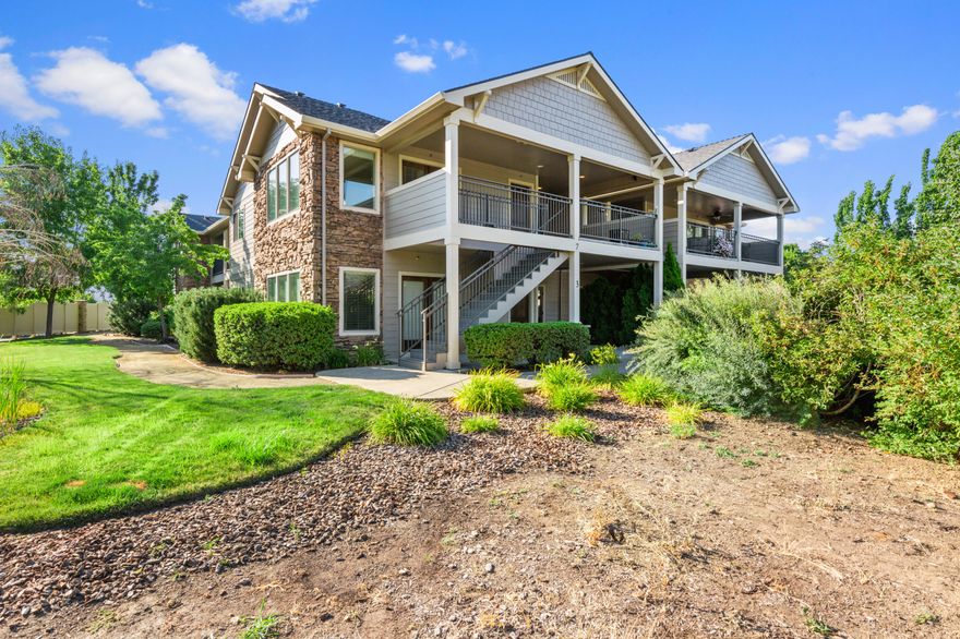 Gorgeous luxury condo in East Medford. Upstairs, you'll have a spacious East facing front porch with two sets of French doors and a smart lock formal entryway. When you enter, you're welcomed by an open concept living room with a stone fireplace, vaulted ceilings, dining area, and updated kitchen with SS appliances, gas range, and a brand new top of the line refrigerator. The primary bedroom offers an additional balcony with beautiful mountain views, a large bathroom, and an oversized walk-in closet. The flooring has been recently updated throughout, and the brand new Washer and Dryer are included as well. Just minutes from golf, gym, shopping and restaurants, this condo is easy living.